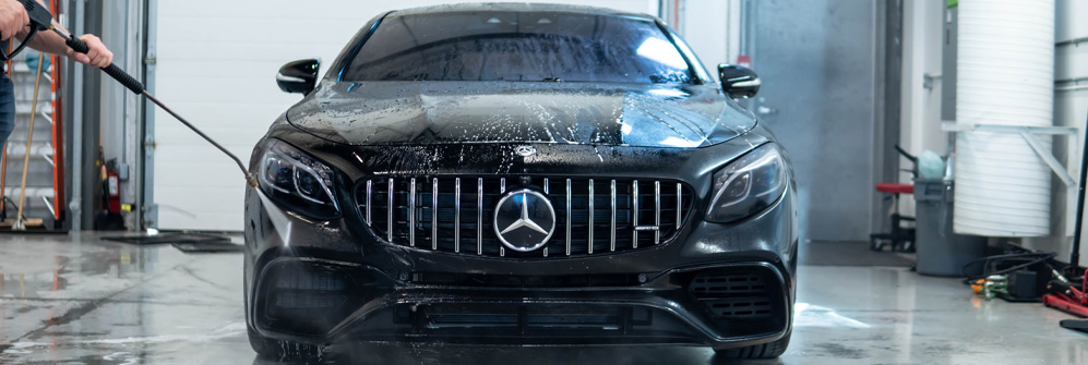 Mercedes-Benz exterior detailing in professional facility